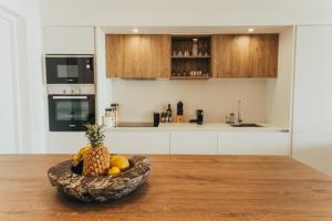 Kuchyň nebo kuchyňský kout v ubytování Appartement de luxe piscine et vue mer