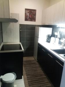 Kuchyň nebo kuchyňský kout v ubytování Bianco nero appartamento + 35 fotografií