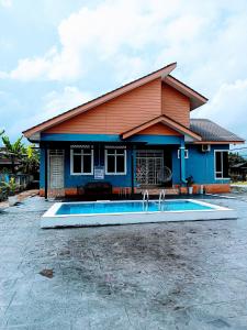 Swimmingpoolen hos eller tæt på Rumah Singgah Homestay