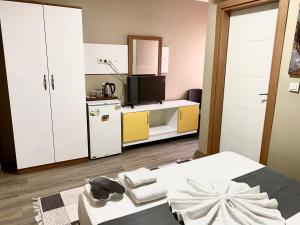 Kuchyň nebo kuchyňský kout v ubytování Airport Best Hotel