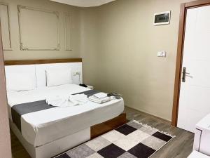 Postel nebo postele na pokoji v ubytování Airport Best Hotel