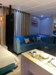 Fotografie z fotogalerie ubytování Teal Open Plan Studio Unit-Lekki 1, WI-FI, Extractor. v destinaci Ogoyo