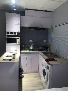 Fotografie z fotogalerie ubytování Teal Open Plan Studio Unit-Lekki 1, WI-FI, Extractor. v destinaci Ogoyo