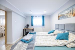 Posteľ alebo postele v izbe v ubytovaní Apartamenty Jelitkowska 13,Gdańsk Jelitkowo, 100m od morza