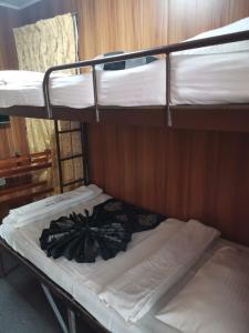 Postel nebo postele na pokoji v ubytování Happy inn
