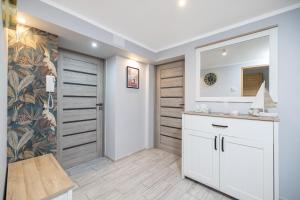 Kuchyňa alebo kuchynka v ubytovaní Apartamenty Jelitkowska 13,Gdańsk Jelitkowo, 100m od morza
