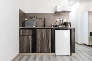 Una cocina o cocineta en C-view Apartments