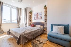 Postel nebo postele na pokoji v ubytování Bright Apartments – 2 Bedroom