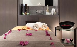 La Suite Boutique Hotel客房内的一张或多张床位