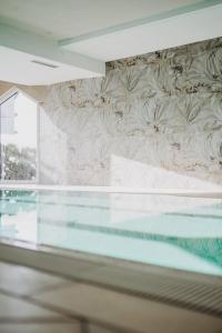 Πισίνα στο ή κοντά στο Brückenwirt's Ferienwohnung