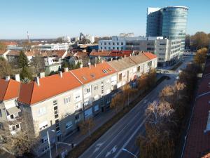an aerial view of a city with buildings and a street at New Green Studio Apartment near Tvrđa in Osijek