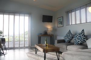Area soggiorno di Dunmore East Ocean View Suite