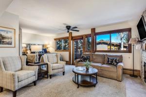 a living room with a couch and chairs and a table at Laurelwood Condominiums 107 in Snowmass Village