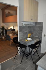 Kuchyňa alebo kuchynka v ubytovaní Angel's Apartman