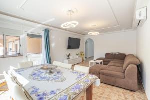 TV a/nebo společenská místnost v ubytování Flatguest Sonneland Suite