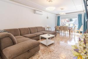 Posezení v ubytování Flatguest Sonneland Suite
