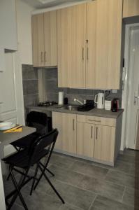 Kuchyňa alebo kuchynka v ubytovaní Angel's Apartman