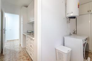 Kuchyň nebo kuchyňský kout v ubytování Flatguest Sonneland Suite