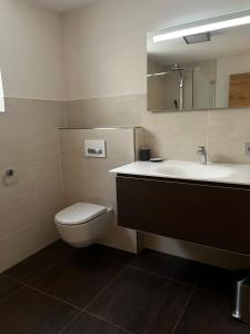 Kúpeľňa v ubytovaní Apartment Am Birkenweg + 13 fotografií