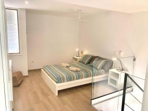 A bed or beds in a room at Dream Holiday Las Americas