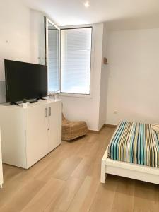 A bed or beds in a room at Dream Holiday Las Americas