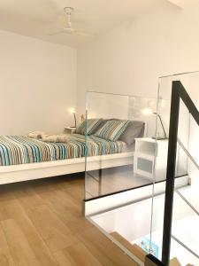 A bed or beds in a room at Dream Holiday Las Americas