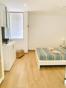A bed or beds in a room at Dream Holiday Las Americas