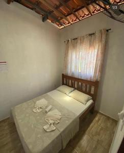 Cama ou camas em um quarto em Pousada House Nativa