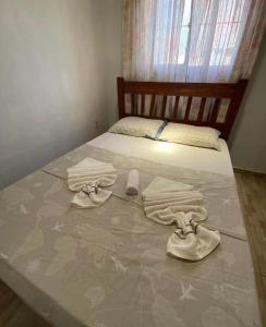Cama ou camas em um quarto em Pousada House Nativa