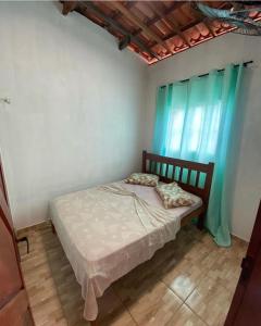 Cama ou camas em um quarto em Pousada House Nativa