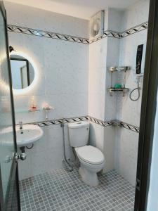 ห้องน้ำของ Góc Hải Phòng Homestay Q4