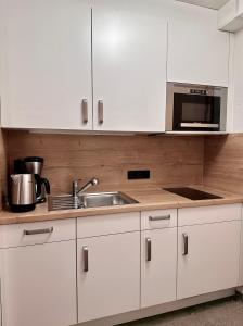 Küche/Küchenzeile in der Unterkunft Kleinwalsertal Apartment