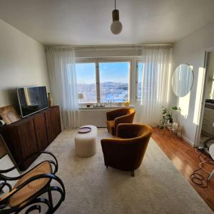 Oleskelutila majoituspaikassa Top floor apt with stunning view