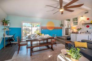 a living room with a table and a couch at Hello Sunshine OC minutes to Disneyland-Family Friendly in Fullerton