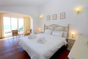 A bed or beds in a room at Townhouse SEASCAPE