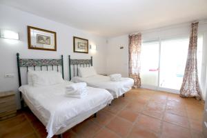 A bed or beds in a room at Townhouse SEASCAPE