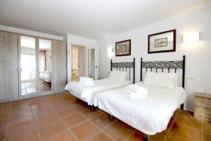 A bed or beds in a room at Townhouse SEASCAPE