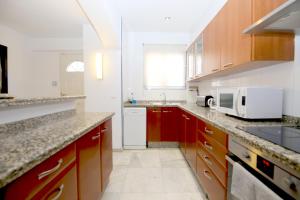 A kitchen or kitchenette at Townhouse SEASCAPE