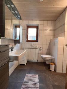 Een badkamer bij Apartment Lopez