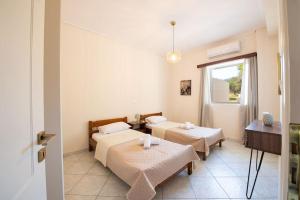 Fotografie z fotogalerie ubytování Όμορφο παραθαΣυγκρότημα ενοικιαζόμενων καταλυμάτων ως ολόκληρος χώρος - Chrani, Ελλάδαλάσσιο διαμέρισμα v destinaci Chrani