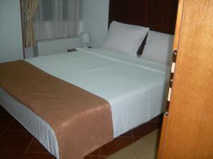 Кровать или кровати в номере Hotel Danica