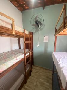 Cama ou camas em um quarto em Pousada House Nativa