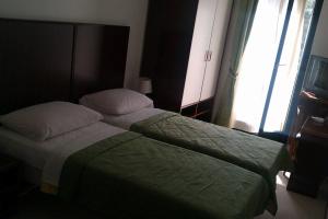 Кровать или кровати в номере Hotel Danica