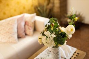 Rúm í herbergi á ROMANTIK HOTEL ELEONORA