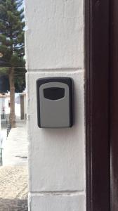 a black and white object on the side of a wall at Meriga in Agulo
