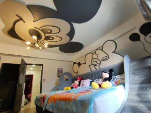 Cama ou camas em um quarto em Wujie Childlike B&B