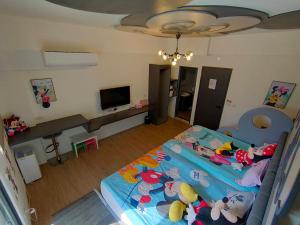 Cama ou camas em um quarto em Wujie Childlike B&B