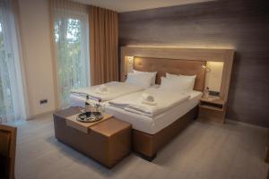 Postel nebo postele na pokoji v ubytování C-YOU Hotel Chemnitz