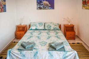 Кровать или кровати в номере Nest View House