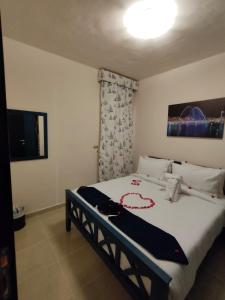 Postel nebo postele na pokoji v ubytování Porto Sharm-Elsheikh